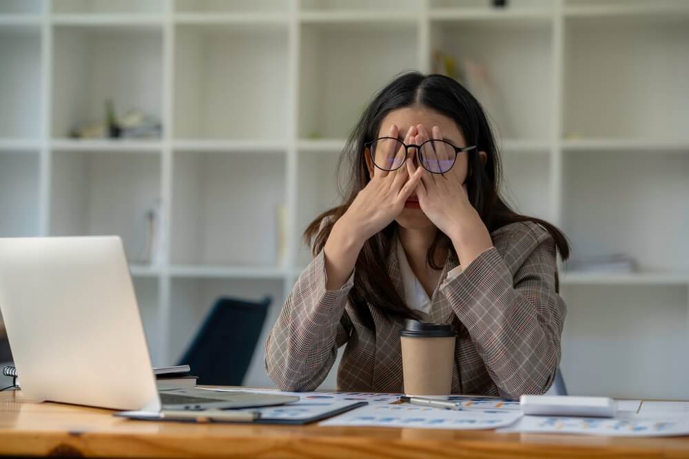 tired,business,woman,sleepy,and,bored,from,sitting,at,a